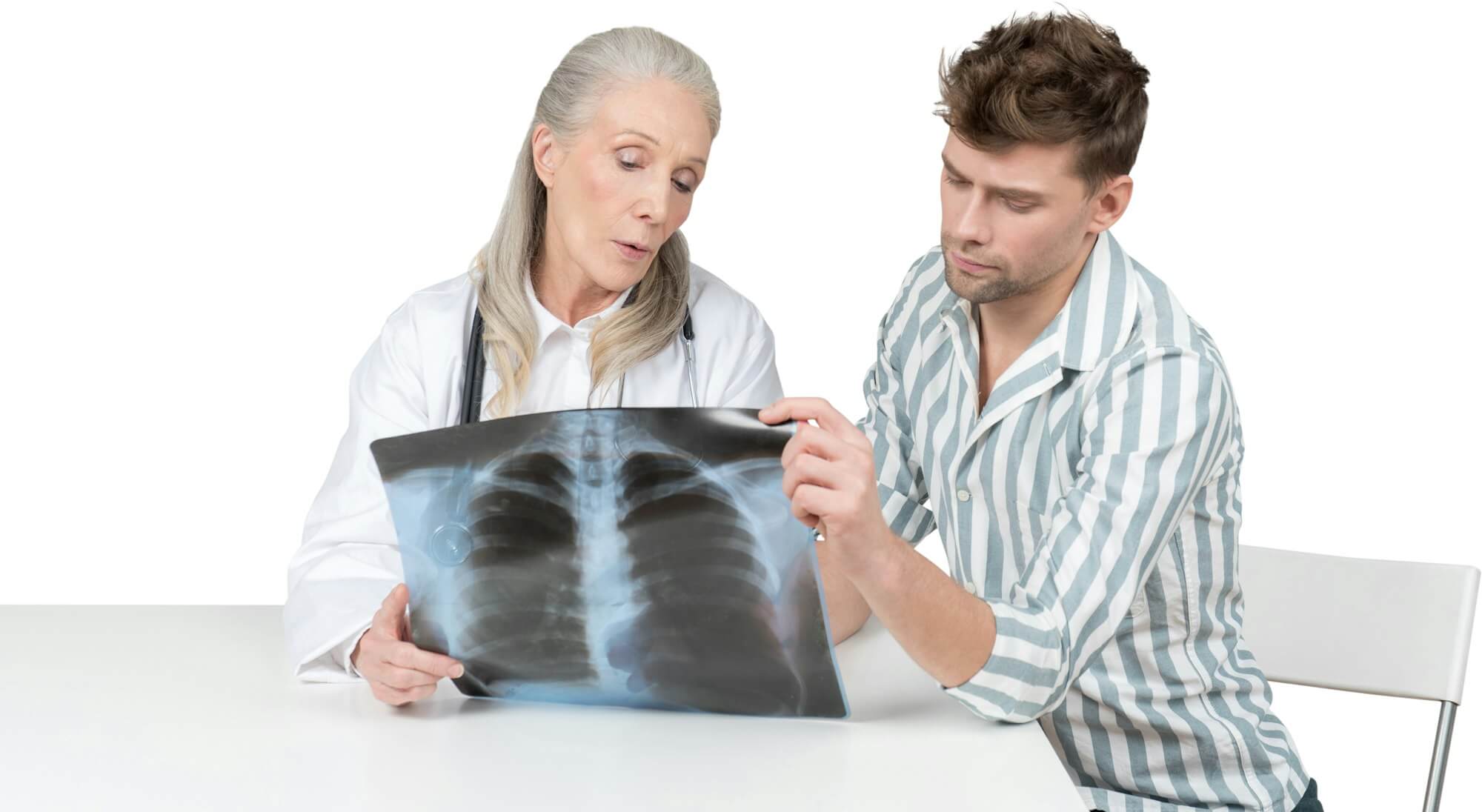 a man and a woman looking at an xray of a lung